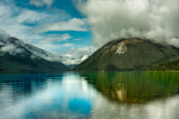 Mirror reflections on the Forest enclosed Lake Rotoiti at St Arnaud Nelson