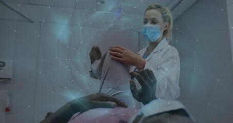 Female doctor in clinic lifting patient left leg examining knee and activating AI overlay shifting - Powered by Adobe