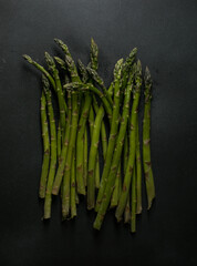 Fresh Green Asparagus on Dark Background