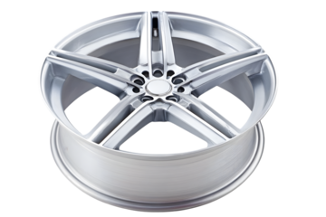 A close-up studio shot of a shiny, silver alloy car wheel.