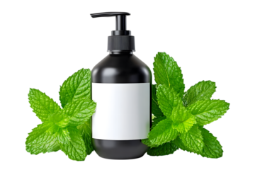 A black bottle of soap with a blank label, surrounded by fresh green mint leaves.