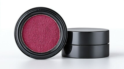 Two round containers of a deep reddish-purple cosmetic powder.