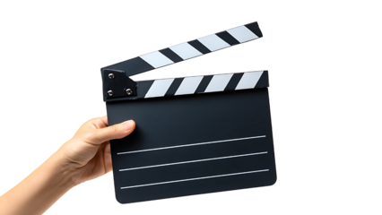 A hand holds a black and white striped clapper board.