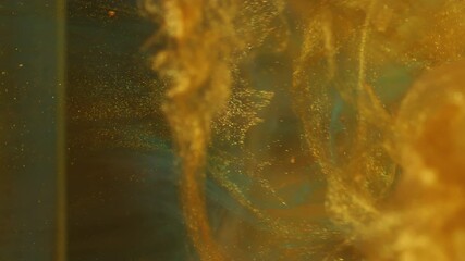 Vertical video. Particles paint. Splash sphere. Defocused golden yellow blue color sparkling water texture on abstract art background. - Powered by Adobe