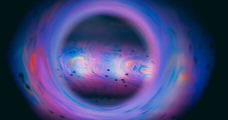 Soap blur bubble. Colorful paint planet. Round lens mix dye flow on purple violet frame background....