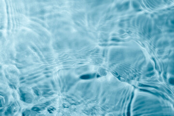 Blue water texture background. Clean transparent water surface with ripples. Summer concept. Flat...