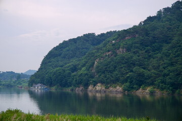 Fototapeta premium Buso Mountain and Nakwaam Rock Overlooking Geum River