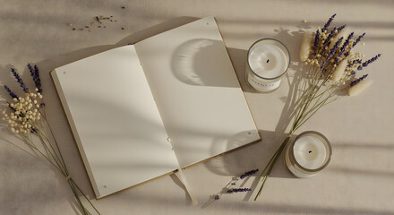Open Blank Notebook with Candles and Lavender Flowers on Light Table
