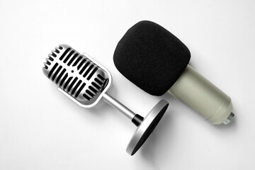 Studio and vintage silver microphone for podcasting or streaming with a white background. Top view