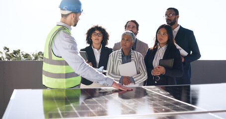 Presentation, solar panel and engineer with business people outdoor for photovoltaic, property and...