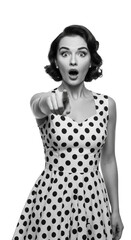 Isolated Retro Woman in Polka Dot Dress Pointing with Surprise