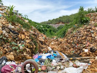 Pile of garbage at landfill background 