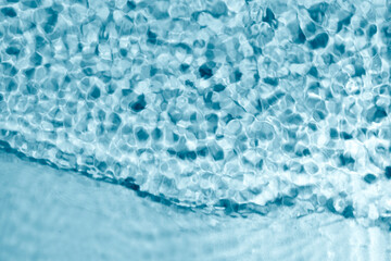 Blue water texture background. Clean transparent water surface with ripples. Summer concept. Flat...
