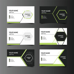 Modern abstract business card templates with green and black circuit board designs for technology and digital industry professionals.