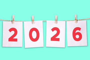 2026 Number Hanging on Rope – New Year and Future Planning Concept on Pastel Background