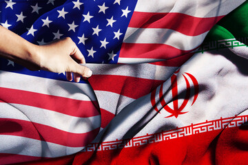USA and Iran Flags Intertwined: Geopolitical Relations and Conflict