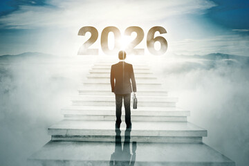 Businessman Climbing Stairway to 2026 in Dreamy Sky Concept