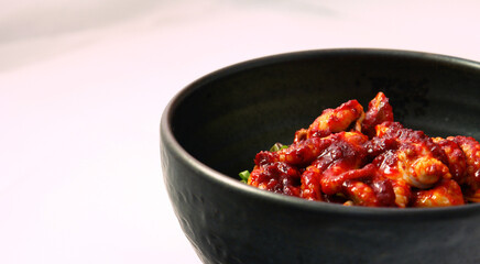 Spicy Korean Seafood Bibimbap in Ceramic Bowl