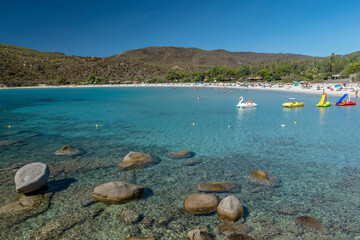 The beautiful white sand and granite rocks beach of Cala Pira, Sardinia, Italy