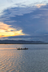 Fototapeta premium Fishing Boat on the Ocean at Sunset
