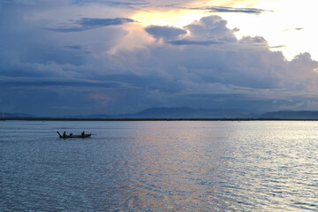 Boat on Water at Sunset