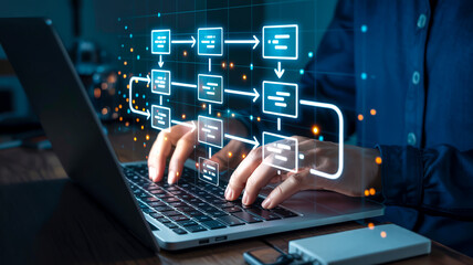 Hands typing on silver MacBook keyboard with floating white rectangles, arrows forming a digital process diagram