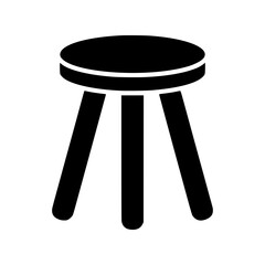 Simple black graphic of a wooden stool with three legs and circular seat in silhouette style