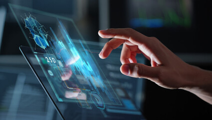 Fototapeta premium Corporate Executive Interacting with Advanced Hologram Interface for Business Intelligence, Analytics, and Strategy Planning