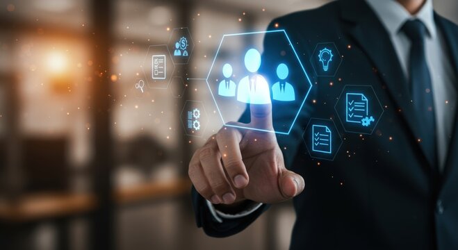 Businessman interacts with a futuristic digital interface displaying team management and business process icons with glowing particles
