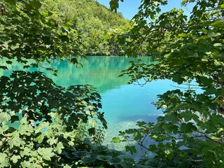 Immerse yourself in the natural beauty of Plitvice Lakes, where stunning waterfalls cascade into...