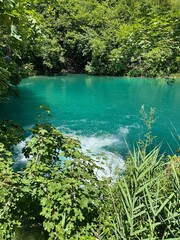 Experience the breathtaking rugged beauty of Plitvice Lakes in Croatia, marked by turquoise waters...