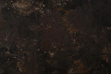 Dark rusty metal texture with deep corrosion and gritty surface