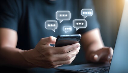 Man using smartphone for online messaging with chat bubbles floating in digital interface