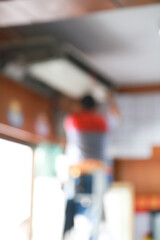 Abstract blurred an air conditioner cleaning in a room Background.
