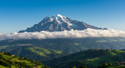 Fototapeta premium Majestic Mountain Peak Soaring Above Cloudscape Breathtaking Alpine Scenery