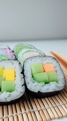 Colorful Vegetarian Sushi Rolls on Bamboo Mat