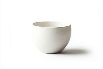 White ceramic cup and dishware on clean white background