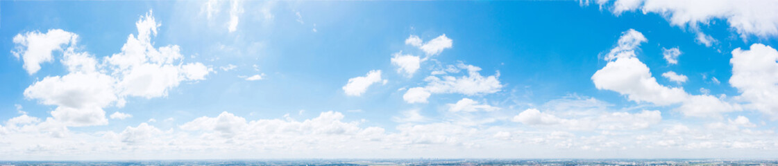 Wide-angle image of clear sky with scattered cumulus clouds, offering a serene and inspiring scene ideal for use in presentations, web design, or advertisements.
