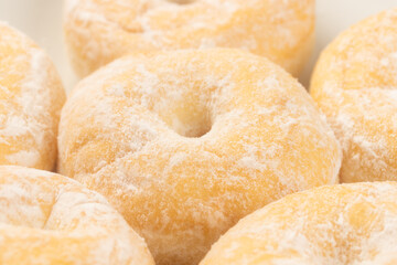 Powdered Sugar Donuts. Close up