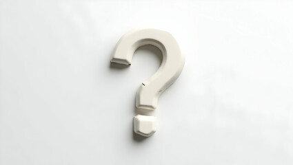 Question icon A broken ceramic question mark cracked in half, laid down neatly on a white floor