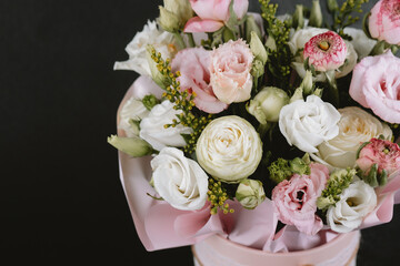 Beautiful floral bouquet features pink and white roses arranged elegantly