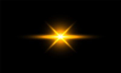 golden lens flare on black background