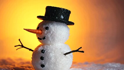 A cheerful snowman with a black hat and orange carrot nose stands against a warm sunset background - Powered by Adobe