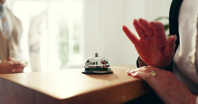 Secretary, guest and hands on bell at hotel reception as customer for help, answer and hospitality. People, arrival and ring at front desk of resort for accommodation, client booking or reservation