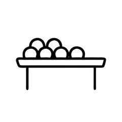 Fruit sorting table with round fruits displayed in a line  