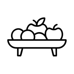 Fruit basket with apples and oranges displayed on wooden table  