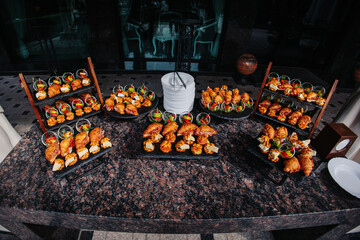 Buffet, self-service table. A wide variety of snacks. The reception of an expensive restaurant, delicious appetizers.