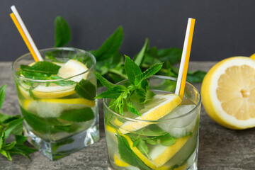 Mojito summer refreshing cocktail with ice and mint. mojito cocktail with lime, lemon and mint in a...
