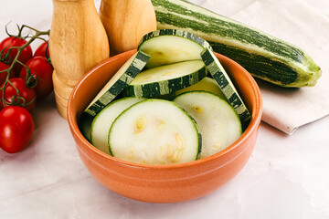 Raw green zucchini slices for cooking