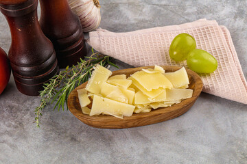 Parmesan cheese slices in the bowl